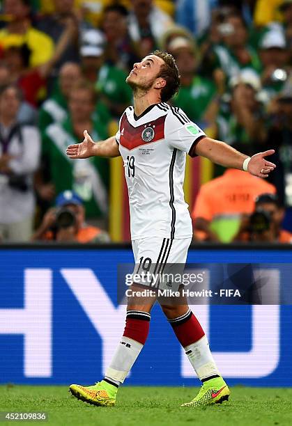 Mario Goetze of Germany celebrates scoring his team's first goal during the 2014 FIFA World Cup Brazil Final match between Germany and Argentina at...