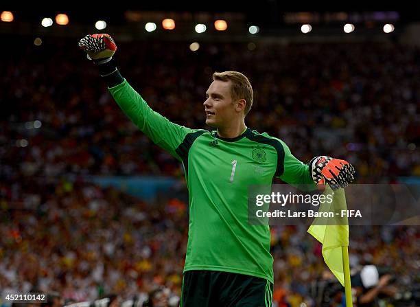 Manuel Neuer of Germany celebrates his team's first goal during the 2014 FIFA World Cup Brazil Final match between Germany and Argentina at Maracana...