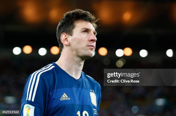 Lionel Messi of Argentina looks on after being defeated by Germany 1-0 during the 2014 FIFA World Cup Brazil Final match between Germany and...