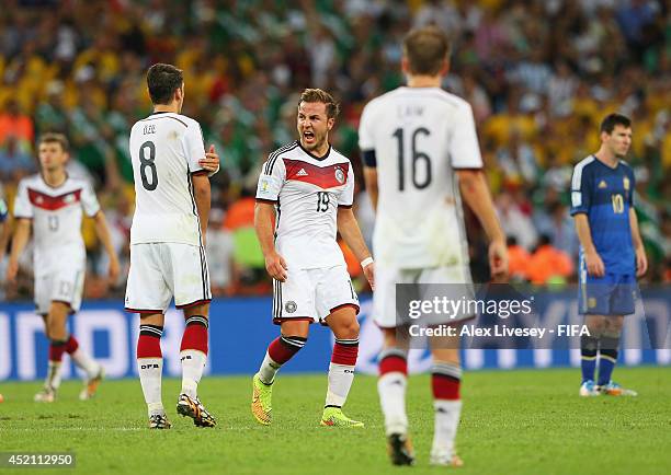 Mario Goetze of Germany celebrates scoring his team's first goal during the 2014 FIFA World Cup Brazil Final match between Germany and Argentina at...