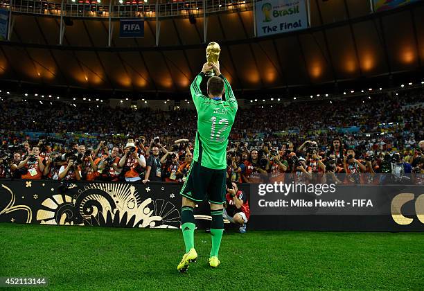 Ron-Robert Zieler of Germany lifts the World Cup after the 2014 FIFA World Cup Brazil Final match between Germany and Argentina at Maracana on July...