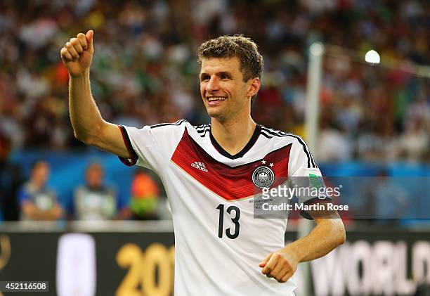 Thomas Mueller of Germany celebrates after defeating Argentina 1-0 in extra time during the 2014 FIFA World Cup Brazil Final match between Germany...