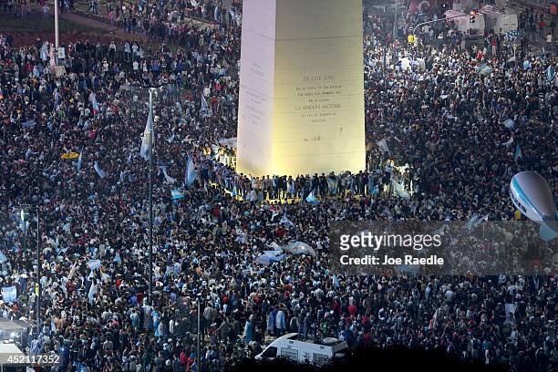 Argentine soccer fans fill an area near the Obelisco de Buenos Aires after the World Cup final on July 13, 2014 in Buenos Aires, Argentina. Germany...