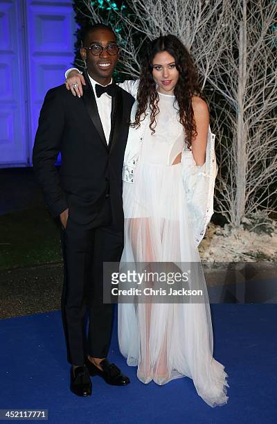 Singer Tinie Tempah and Eliza Doolittle arrive at Kensington Palace for the Centrepoint Winter Whites Gala on November 26, 2013 in London, England.