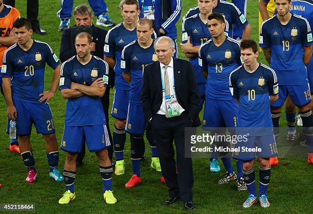 Head coach Alejandro Sabella of Argentina looks on with his team after being defeated by Germany 1-0 in extra time during the 2014 FIFA World Cup...