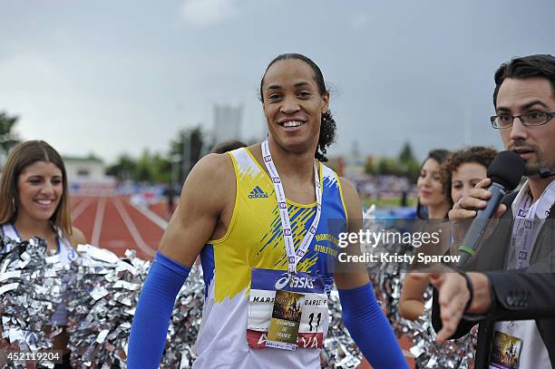 Pascal Martinot-Lagarde wins first place in the 110 Meter Hurdles during the Championnats de France d'Athletisme Elite on July 13, 2014 in Reims,...