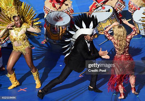 Musicians Carlinhos Brown and Shakira perform during the closing ceremony prior to the 2014 FIFA World Cup Brazil Final match between Germany and...