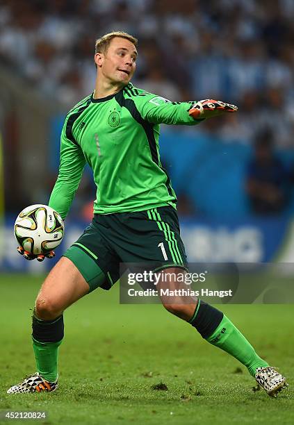 Goalkeeper Manuel Neuer of Germany controls the ball during the 2014 FIFA World Cup Brazil Final match between Germany and Argentina at Maracana on...