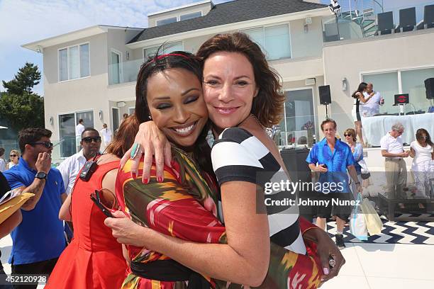 Cynthia Bailey and LuAnn De Lesseps attend Jill Zarin's 2nd Annual Luxury Ladies Luncheon on July 13, 2014 in Southampton, New York.