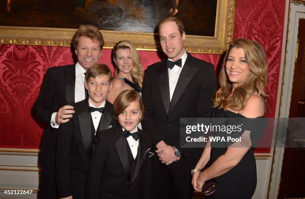 Prince William, Duke of Cambridge meets Jon Bon Jovi and wife Dorothea Hurley and their children Jacob , Stephanie and Romeo at Kensington Palace for...