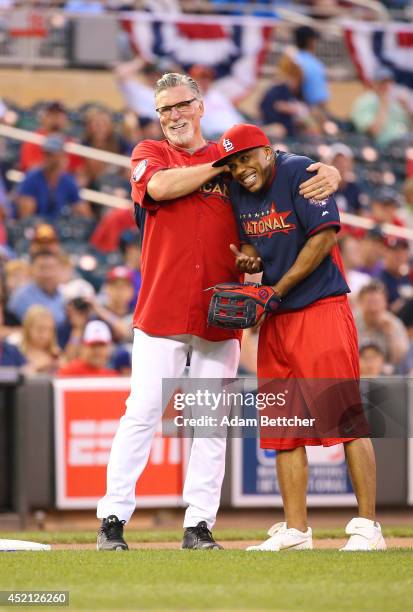 Jack Morris and Nelly joke at the 2014 MLB All-Star legends and celebrity softball game on July 13, 2014 at the Target Field in Minneapolis,...