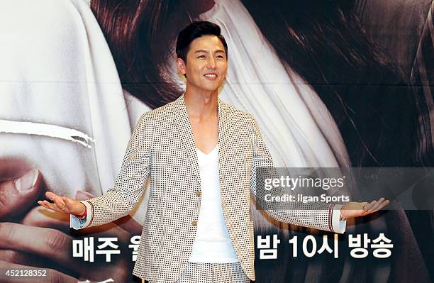 Lee Jung-Jin poses for photographs during the SBS drama 'Temptation' press conference at SBS broadcasting center on July 10, 2014 in Seoul, South...