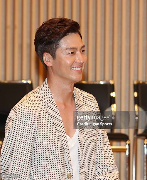 Lee Jung-Jin poses for photographs during the SBS drama 'Temptation' press conference at SBS broadcasting center on July 10, 2014 in Seoul, South...