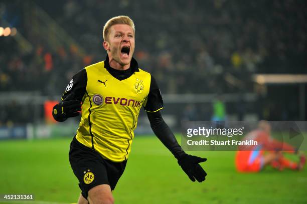 Jakub Blaszczykowski of Dortmund celebrates scoring his team's second goal during the UEFA Champions League Group F match between Borussia Dortmund...