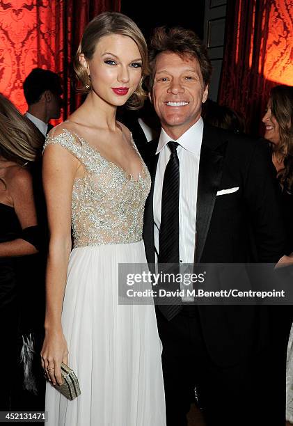 Taylor Swift and Jon Bon Jovi attend the Winter Whites Gala in aid of Centrepoint at Kensington Palace on November 26, 2013 in London, England.