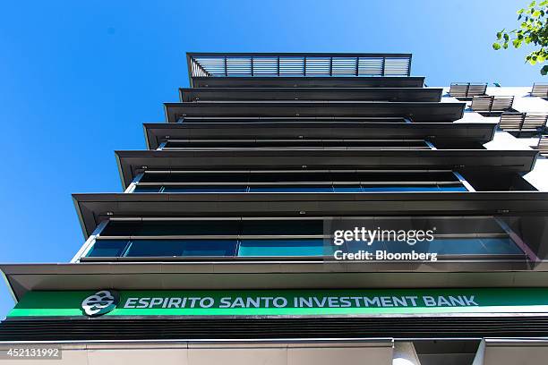 Sign sits on display outside the headquarters of Banco Espirito Santo de Investimento SA in Lisbon, Portugal, on Saturday, July 12, 2014. Banco...