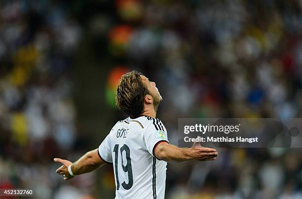 Mario Goetze of Germany celebrates scoring his team's first goal during the 2014 FIFA World Cup Brazil Final match between Germany and Argentina at...