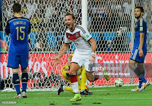 Mario Goetze of Germany celebrates scoring his team's first goal during the 2014 FIFA World Cup Brazil Final match between Germany and Argentina at...