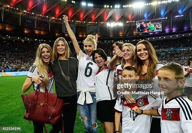 Lisa Rossenbach, Sarah Brandner, Lena Gercke, Kathrin Glich, Lisa Wesseler and Sylwia Klose celebrate after Germany defeat Argentina 1-0 in extra...