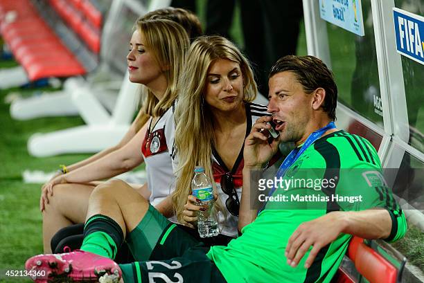 Goalkeeper of Germany Roman Weidenfeller and his girlfriend Lisa Rossenbach celebrate the victory in extra time during the 2014 FIFA World Cup Brazil...