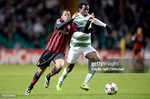 Efe Ambrose of Celtic competes with Robinho of AC Milan during the UEFA Champions League Group H match between Celtic and AC Milan at Celtic Park...