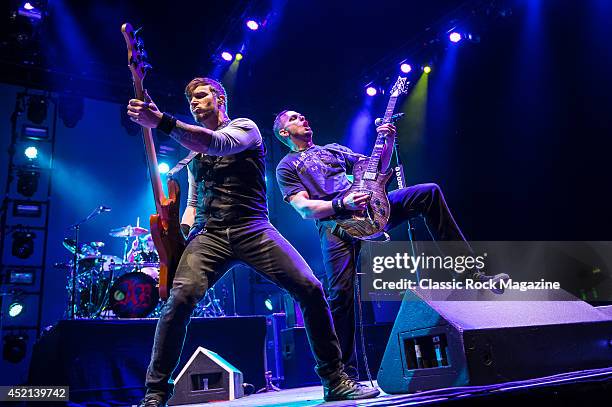 Bassist Brian Marshall and guitarist Mark Tremonti of American rock group Alter Bridge performing live on stage at Wembley Arena in London, on...