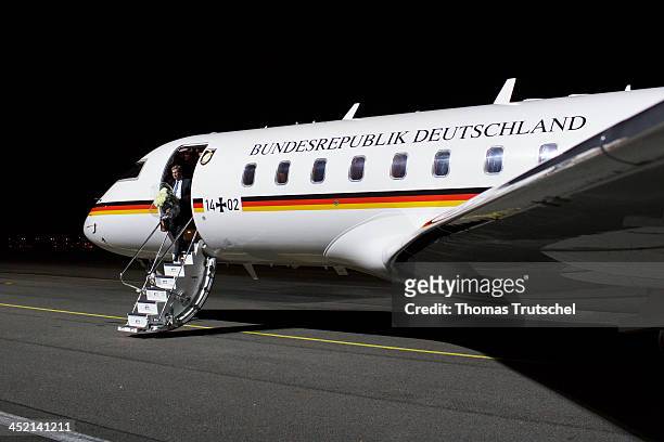 German Foreign Minister Guido Westerwelle leafs a Global 5000 airplane of German Airforce at Berlin Tegel Airport after his one-day-trip to Poland on...