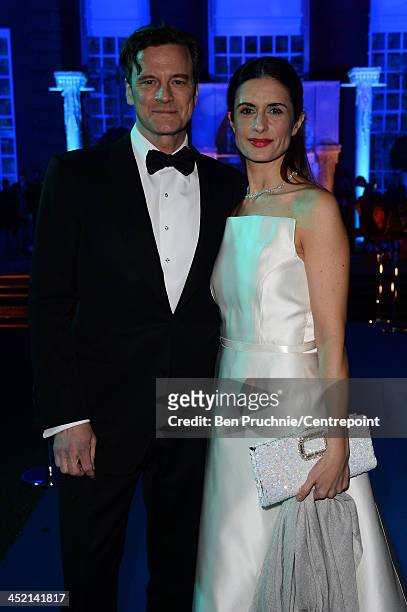 Colin Firth and Livia Firth attend the Winter White Gala In Aid Of Centrepoint on November 26, 2013 in London, England.