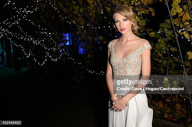 Taylor Swift attends Winter Whites Gala In Aid Of Centrepoint on November 26, 2013 in London, England.