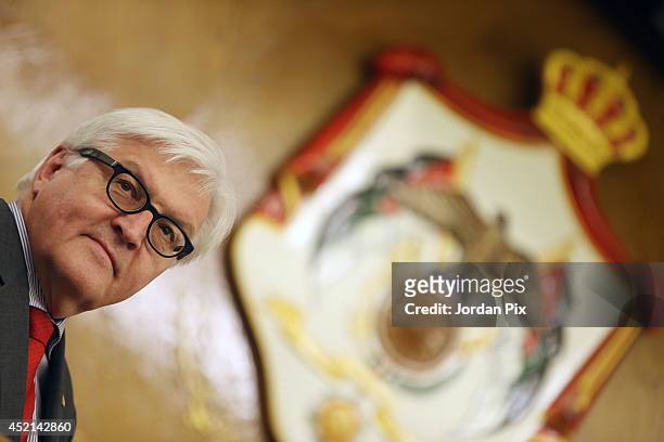 German foreign minister Frank-Walter Steinmeier holds a press conference with his Jordanian counterpart Nasser Joudeh on July 14, 2014 in Amman,...