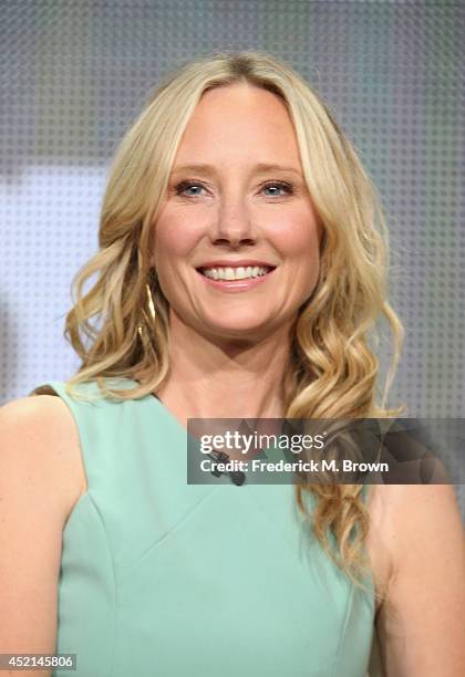 Actress Anne Heche speaks onstage at the 'Dig' panel during the NBCUniversal USA Network portion of the 2014 Summer Television Critics Association at...