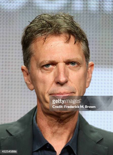 Co-creator/Executive producer Tim Kring speaks onstage at the 'Dig' panel during the NBCUniversal USA Network portion of the 2014 Summer Television...