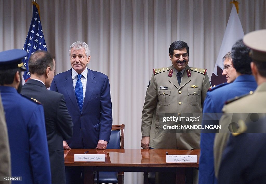 US-QATAR-HAGEL-HAMID