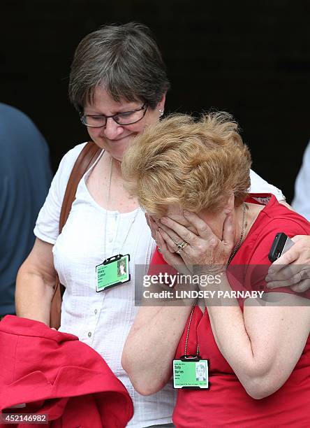 Sally Barnes , media officer of WATCH , reacts as she leaves the venue after members voted to approve the creation of female bishops at the Church of...