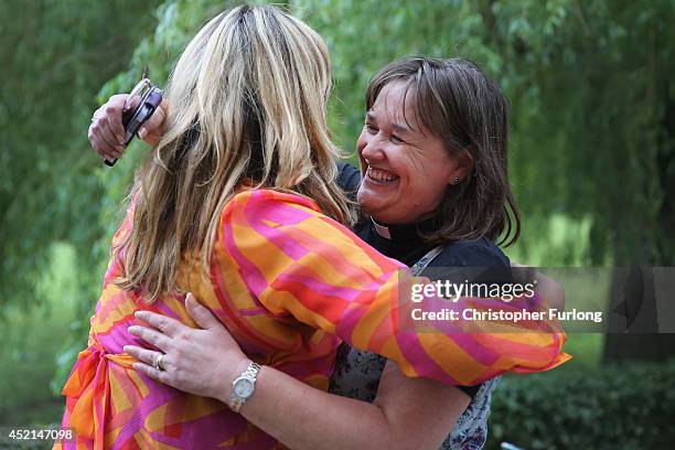 The Revd Emma Percy embraces Revd Jody Stowell after the Church of England General Synod gave their backing to to the ordination of women bishops at...