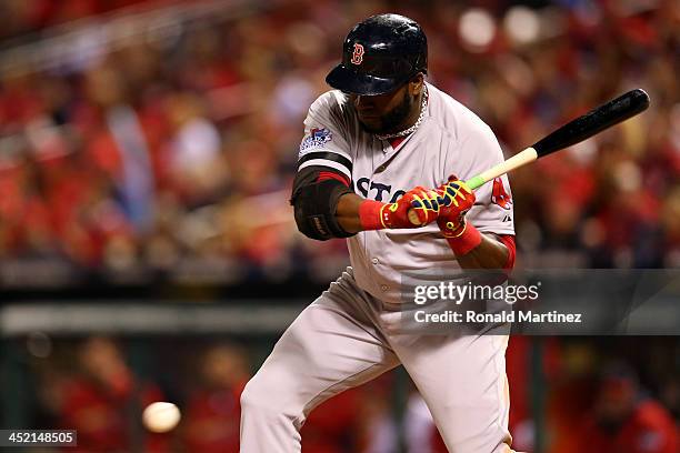 David Ortiz of the Boston Red Sox in action against Lance Lynn of the St. Louis Cardinals in the fifth inning during Game Four of the 2013 World...