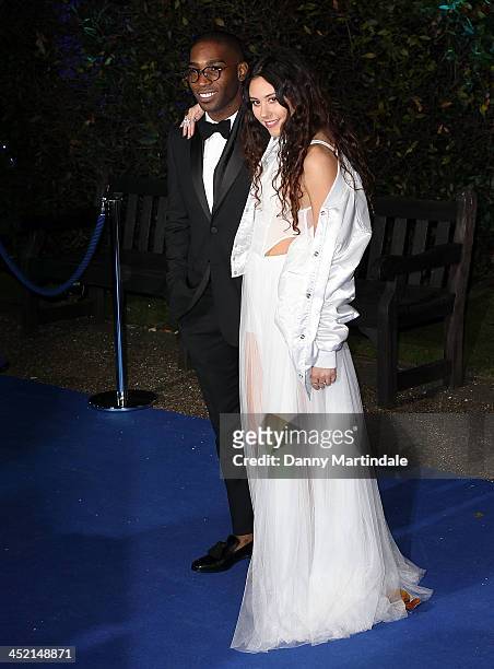 Tinie Tempah and Eliza Doolittle attends the Winter Whites Gala in aid of Centrepoint at Kensington Palace on November 26, 2013 in London, England.