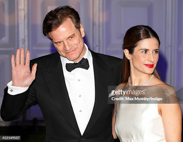 Colin Firth and Livia Firth attend the Centrepoint Winter Whites Gala at Kensington Palace on November 26, 2013 in London, England.