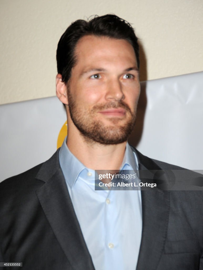 Actor Daniel Cudmore poses inside the press room of the 40th Annual