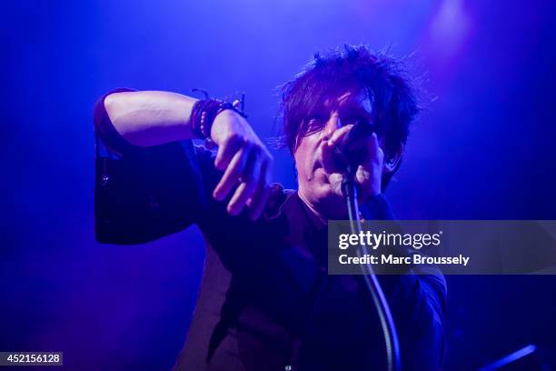 Nicola Sirkis of Indochine performs on stage at Shepherds Bush Empire on July 14, 2014 in London, United Kingdom.