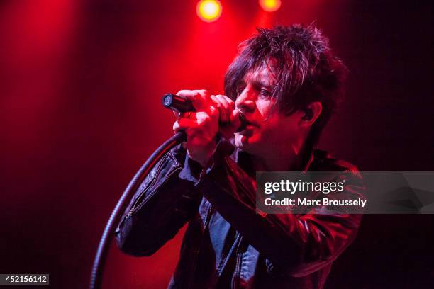 Nicola Sirkis of Indochine performs on stage at Shepherds Bush Empire on July 14, 2014 in London, United Kingdom.