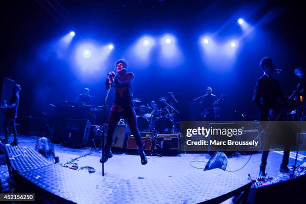 Oli de Sat, Francois Matuszenski, Nicola Sirkis, Mr Shoes, Marc Eliard and Boris Jardel of Indochine perform on stage at Shepherds Bush Empire on...