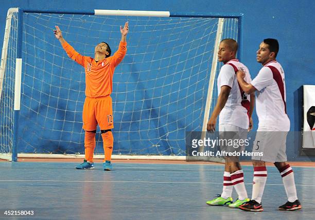 Alison Tizon of Peru celebrates with his teammates after winning the bronze medal during a match between Peru and Ecuador as part of the XVII...