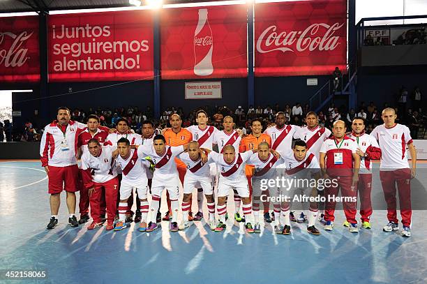 Players of Peru pose for a photo before the match between Peru and Ecuador as part of the XVII Bolivarian Games Trujillo 2013 at VIDENA on November...