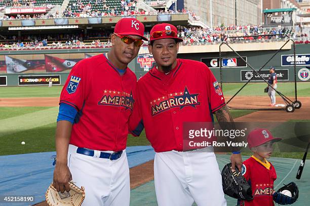Salvador Perez of the Kansas City Royals and Felix Hernandez of the Seattle Mariners pose for a photo during the Gatorade All-Star Workout Day at...