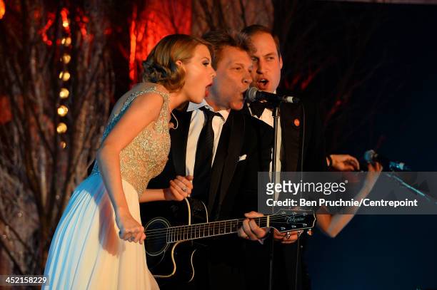 Taylor Swift, Jon Bon Jovi and Prince William, Duke of Cambridge perform during the Winter Whites Gala In Aid Of Centrepoint on November 26, 2013 in...
