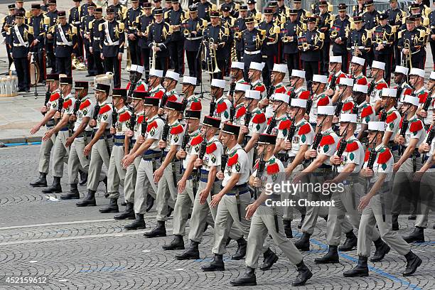 Soldiers of the French Foreign Legion (Legion Etrangere) march down the  Champs Elysees at dawn during a rehearsal of the annual Bastille Day  military parade in Paris, France, on July 10, 2018.