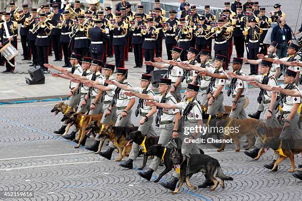 Soldiers of the Cynophilede Ground Army march down the Champs Elysees during the annual Bastille Day military parade, on July 14 in Paris, France....