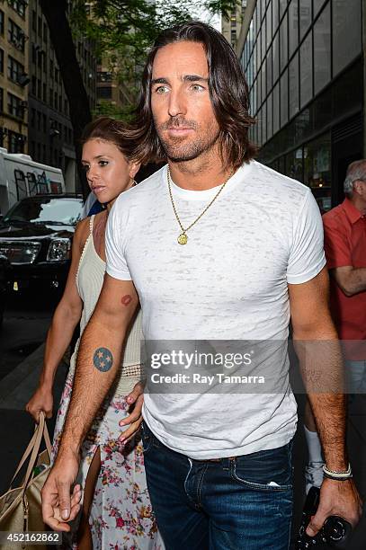 Singer Jake Owen and Lacey Buchanan leave the "Today Show" taping at the NBC Rockefeller Center Studio on July 14, 2014 in New York City.