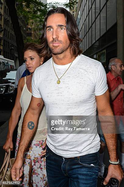 Singer Jake Owen and Lacey Buchanan leave the "Today Show" taping at the NBC Rockefeller Center Studio on July 14, 2014 in New York City.
